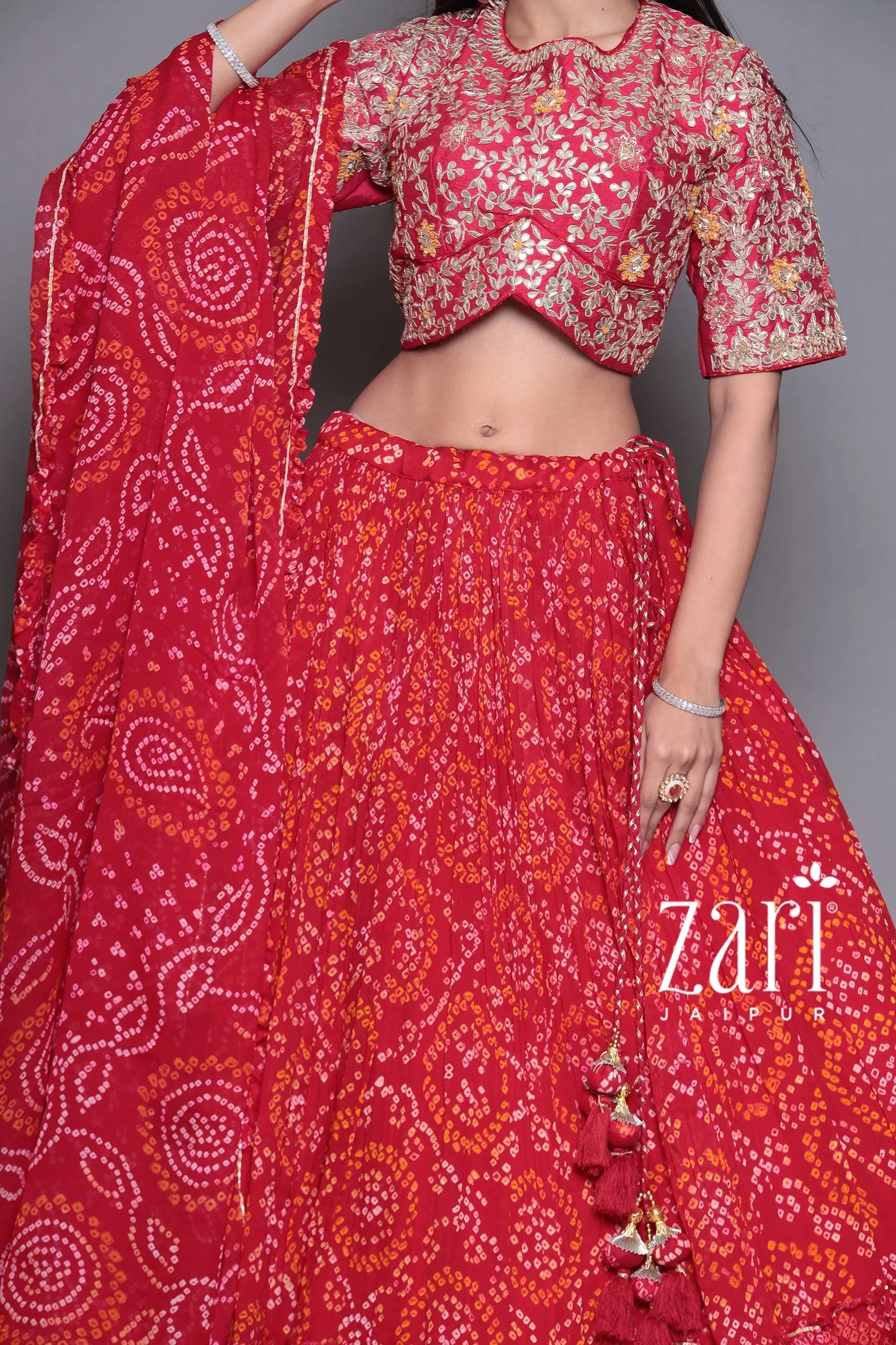 Bandhej Chinon silk  Lehenga with Aari, Gota Patti, Sequins, Thread, Zardozi work.