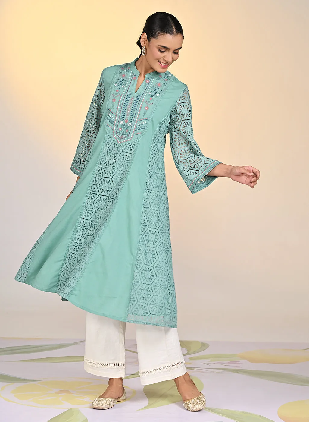 Fariha Carnation Green Embroidered Raschel
Net Dress for Women