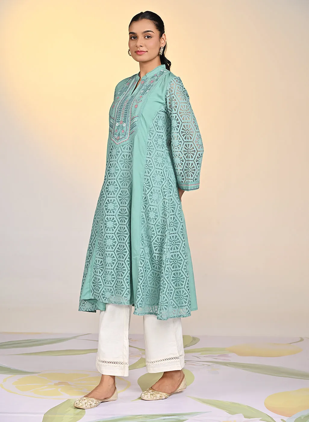 Fariha Carnation Green Embroidered Raschel
Net Dress for Women